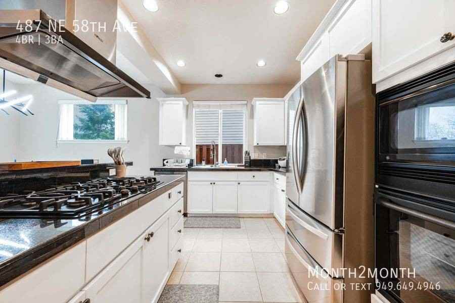 487 Ne 58th Ave - Photo 7 of 26