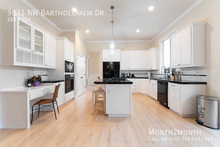 9831 Nw Bartholomew Dr - Photo 6 of 35