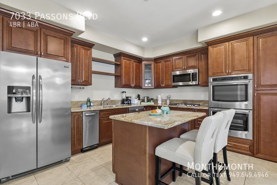 7033 Passons Blvd - Photo 5 of 25