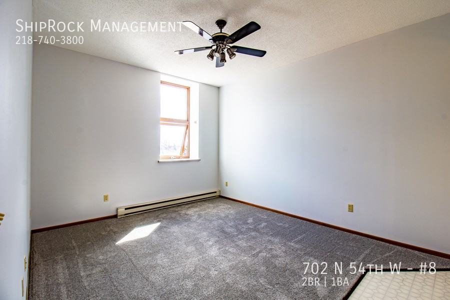 702 N 54th Ave W #8 - Photo 6 of 17