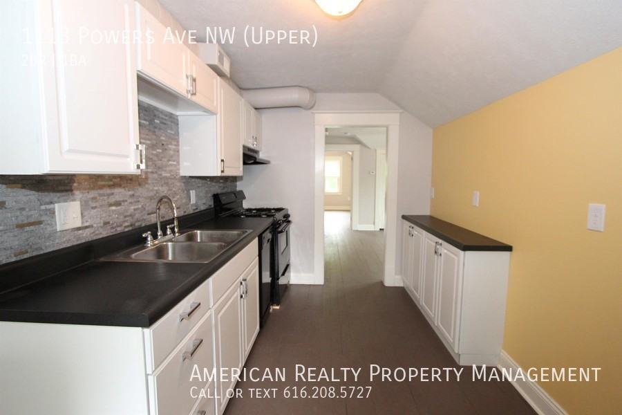 1113 Powers Ave Nw - Photo 2 of 9