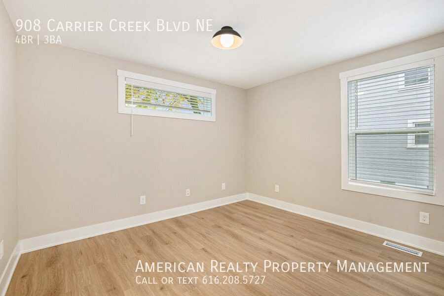 908 Carrier Creek Blvd Ne - Photo 3 of 5