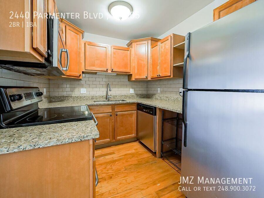 2440 Parmenter Blvd #105 - Photo 2 of 28