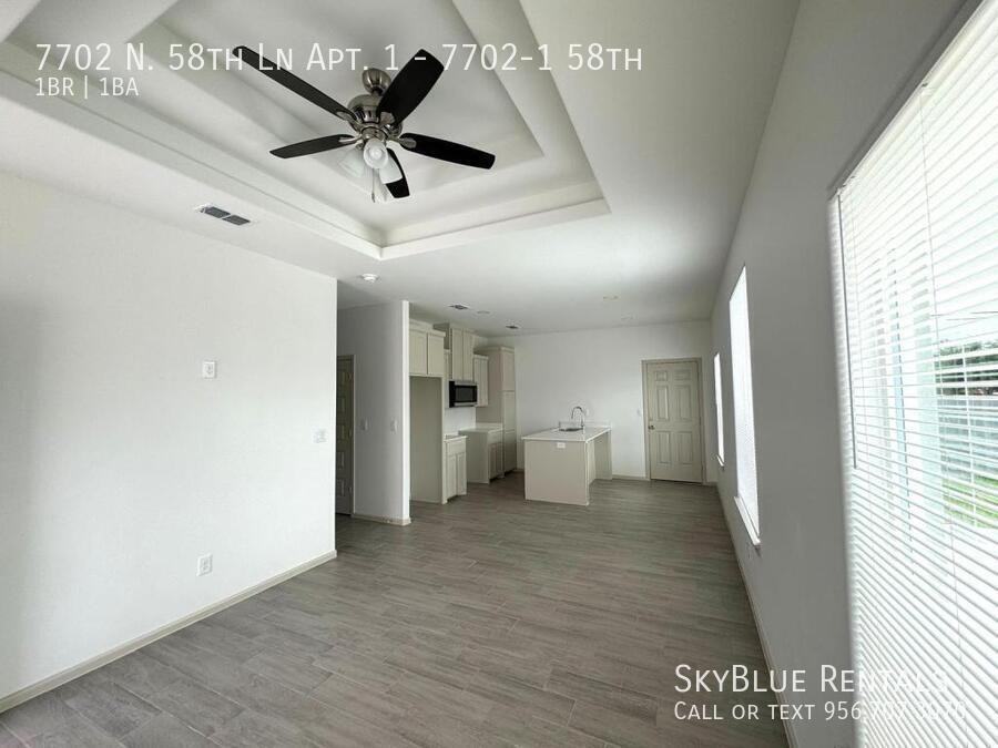 7702 N 58th Ln Apt 1 - Photo 3 of 13