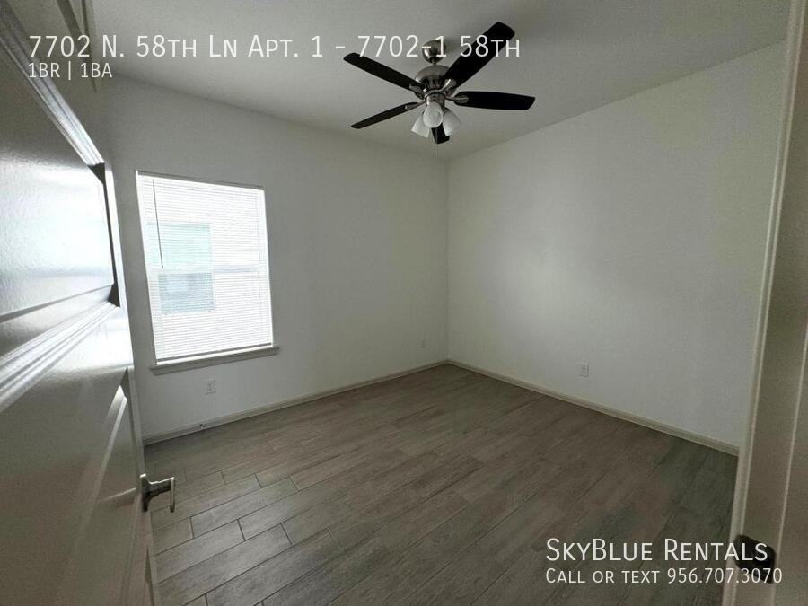 7702 N 58th Ln Apt 1 - Photo 6 of 13