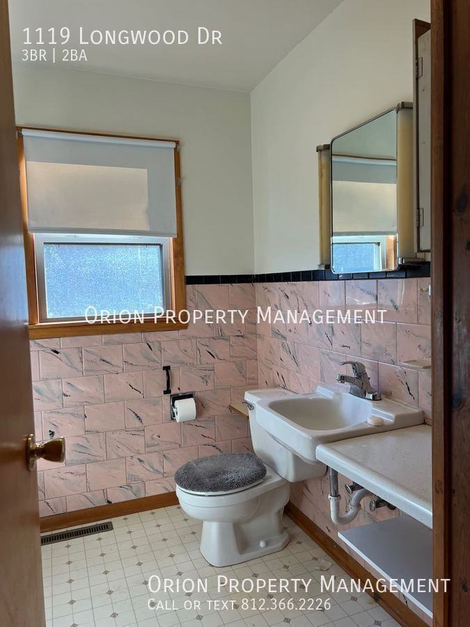 1119 S Longwood Dr - Photo 6 of 13