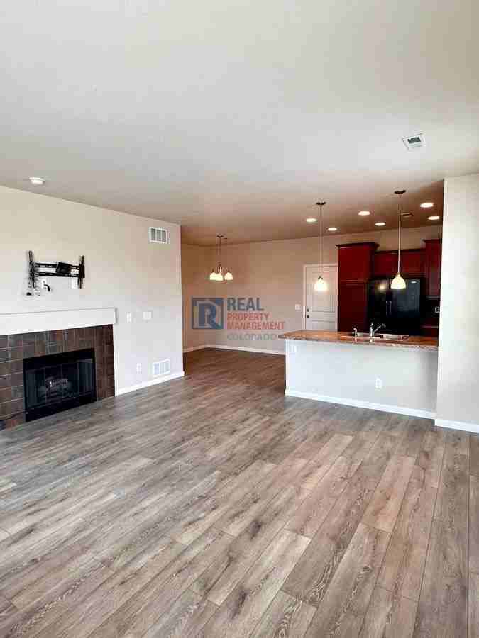 16283 W 63rd Pl #E - Photo 2 of 18