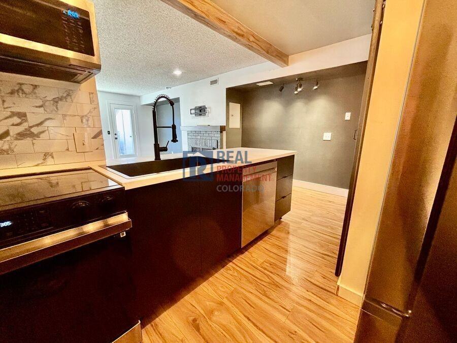 5041 Garrison St - Photo 2 of 12