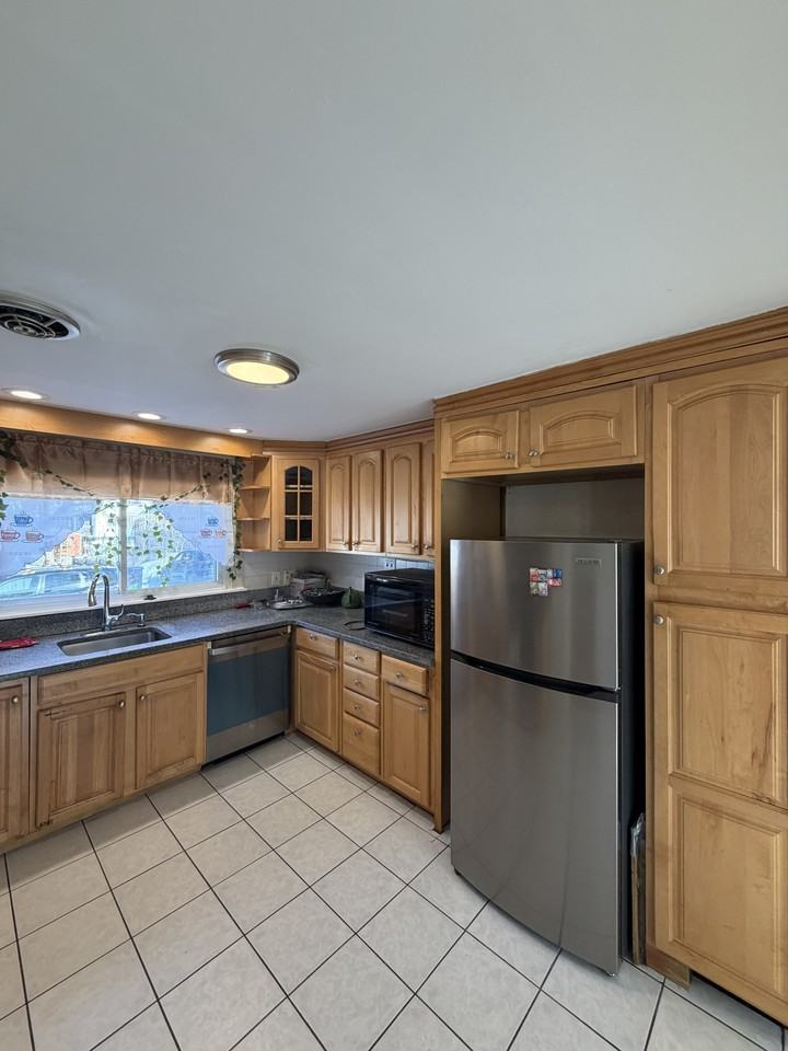 W Roxbury Pkwy - Photo 2 of 32