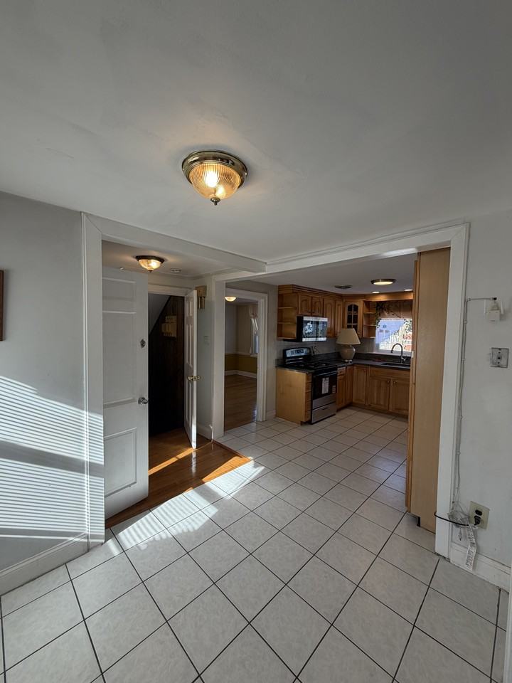 W Roxbury Pkwy - Photo 4 of 32