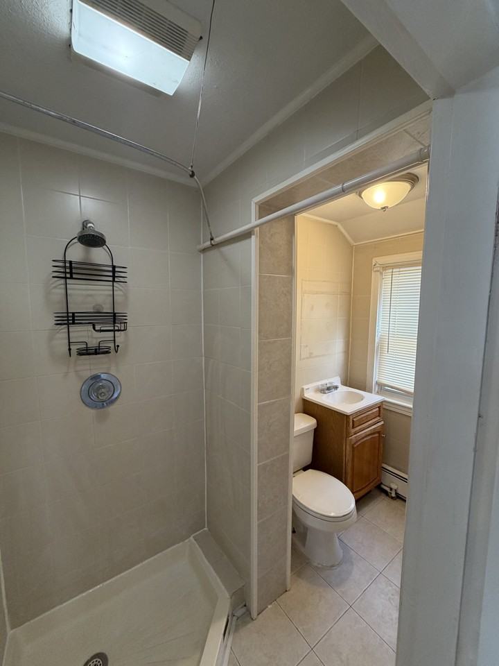 W Roxbury Pkwy - Photo 7 of 32