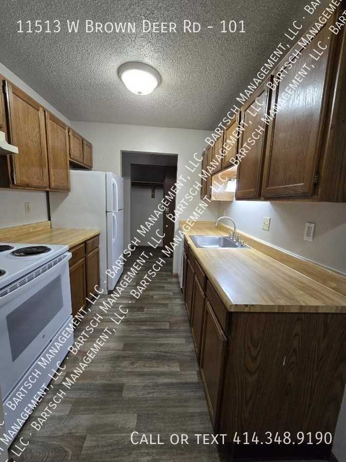 11513 W Brown Deer Rd #101 - Photo 2 of 9