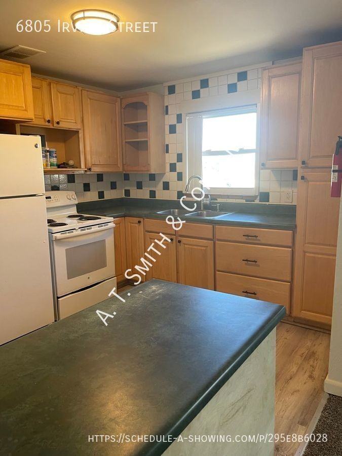 6805 Irving St - Photo 6 of 11