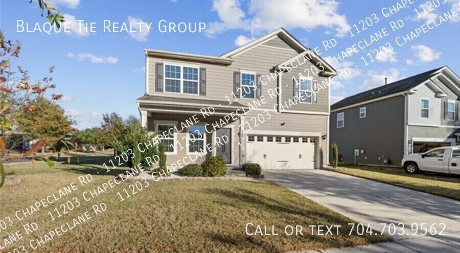 11203 Chapeclane Rd - Photo 2 of 25