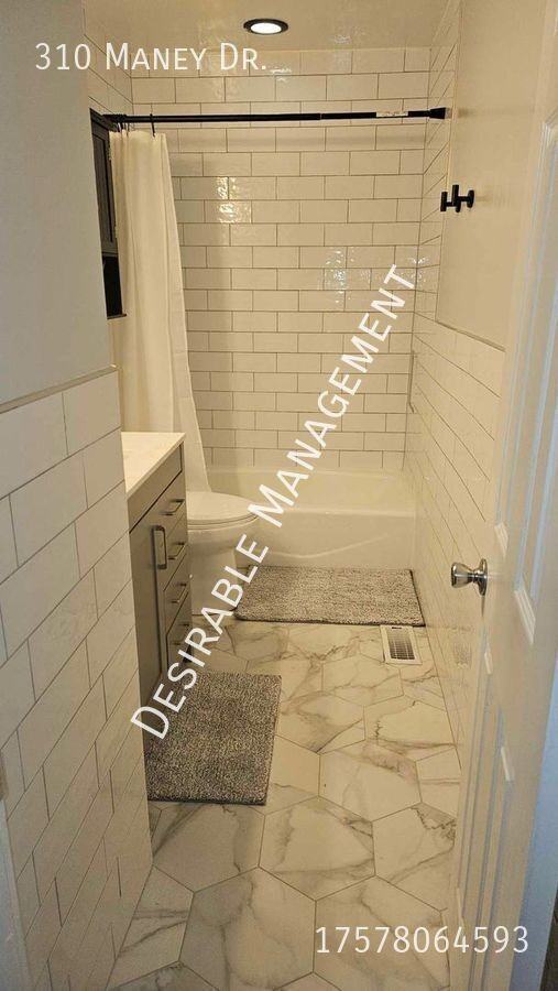 310 Maney Dr - Photo 3 of 20