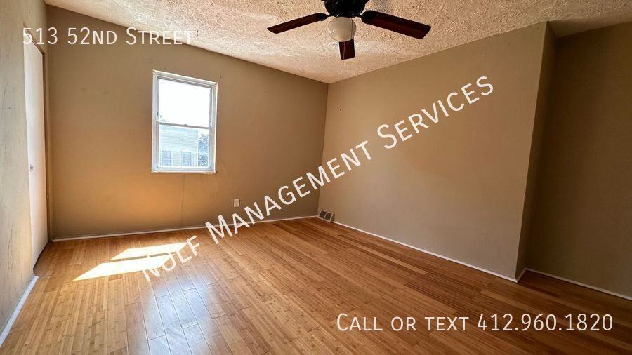 513 52nd St - Photo 6 of 14