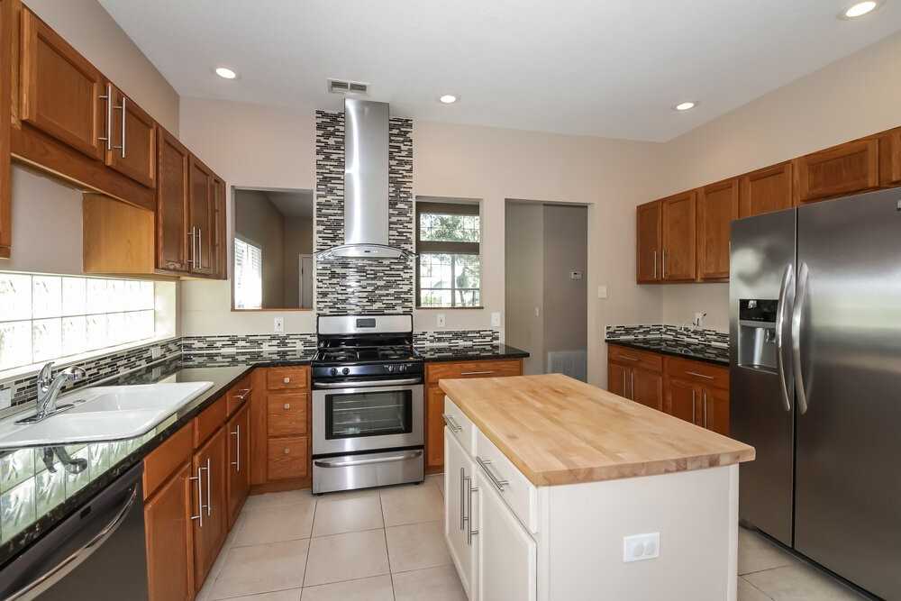 12336 Hollybush Ter - Photo 6 of 17