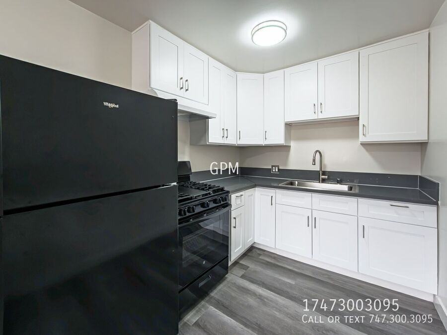 511 N Serrano - APT #6 - Photo 6 of 11