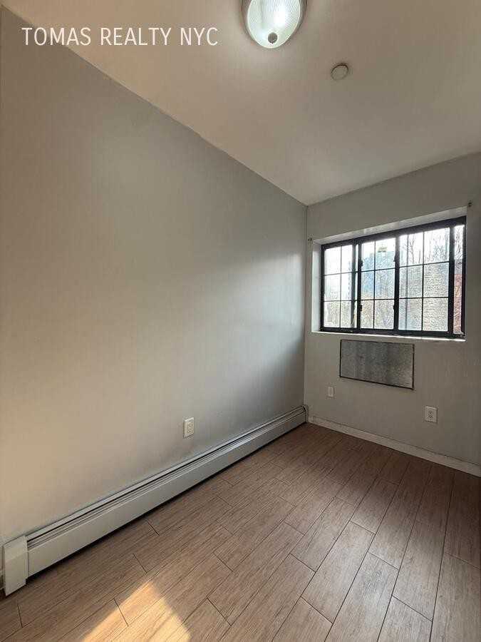 725 E 181st St #3A - Photo 4 of 9