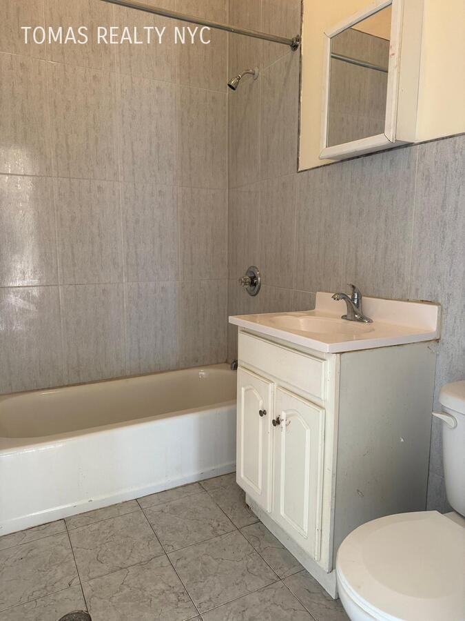 712 E 214th St - Photo 7 of 7