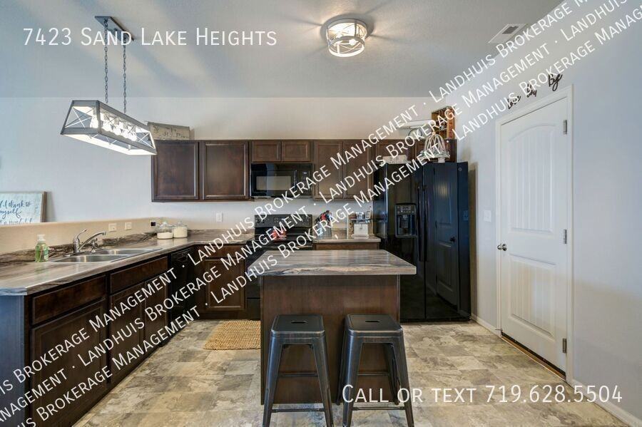7423 Sand Lake Hts - Photo 3 of 14