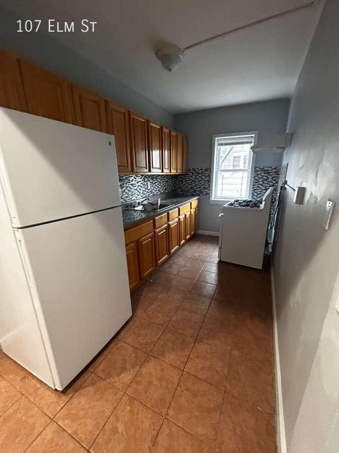 107 Elm St - Photo 3 of 5