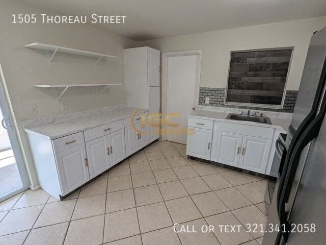 1505 Thoreau St - Photo 2 of 16