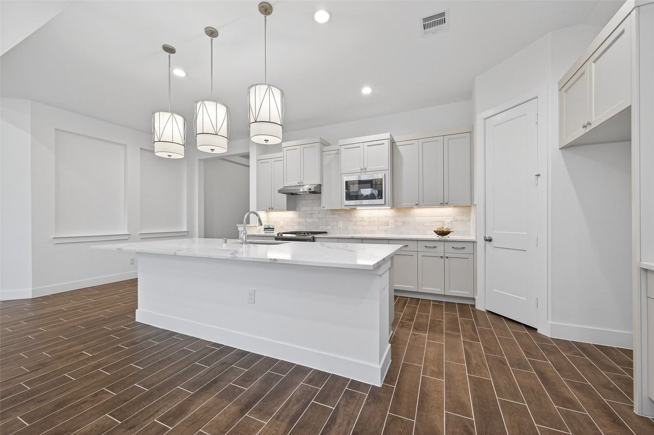 18338 Tiger Flowers Dr #18338 - Photo 5 of 50