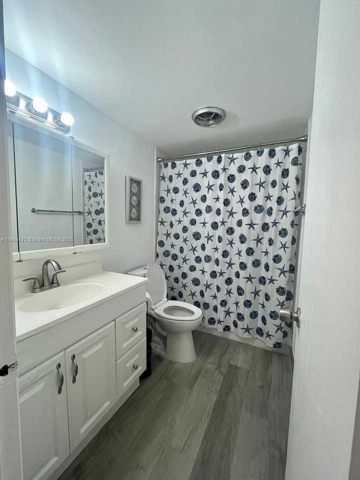 401 Golden Isles Dr #401-916 - Photo 3 of 15