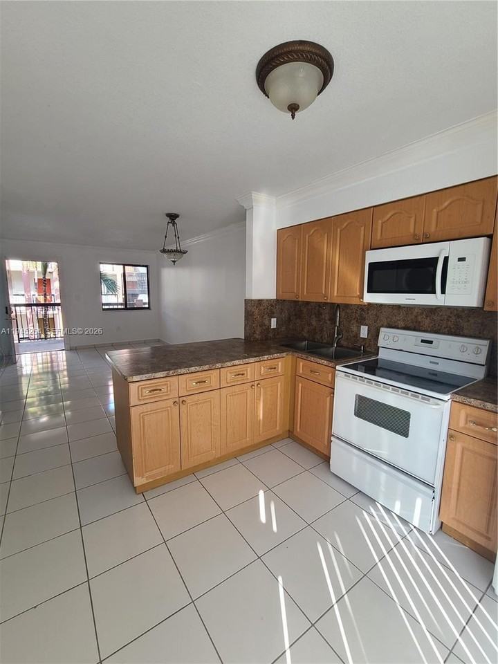 5440 W 21st Ave #5440-302 - Photo 3 of 23