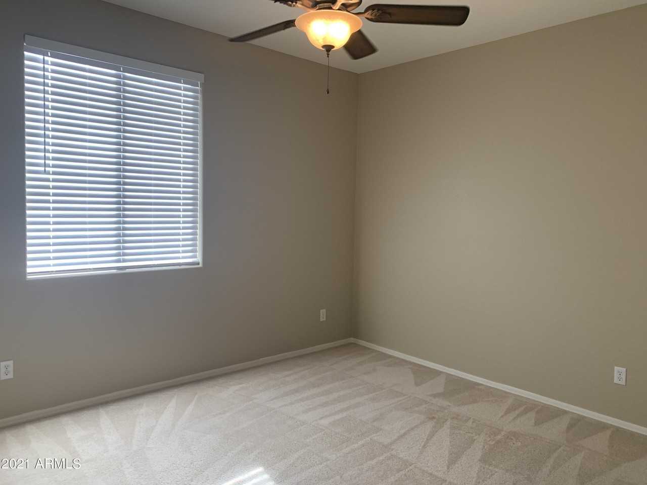 10460 S 182nd Dr #10460 - Photo 2 of 23