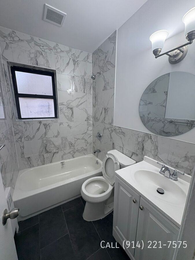 609 Van Cortlandt Park Ave #1 - Photo 3 of 4