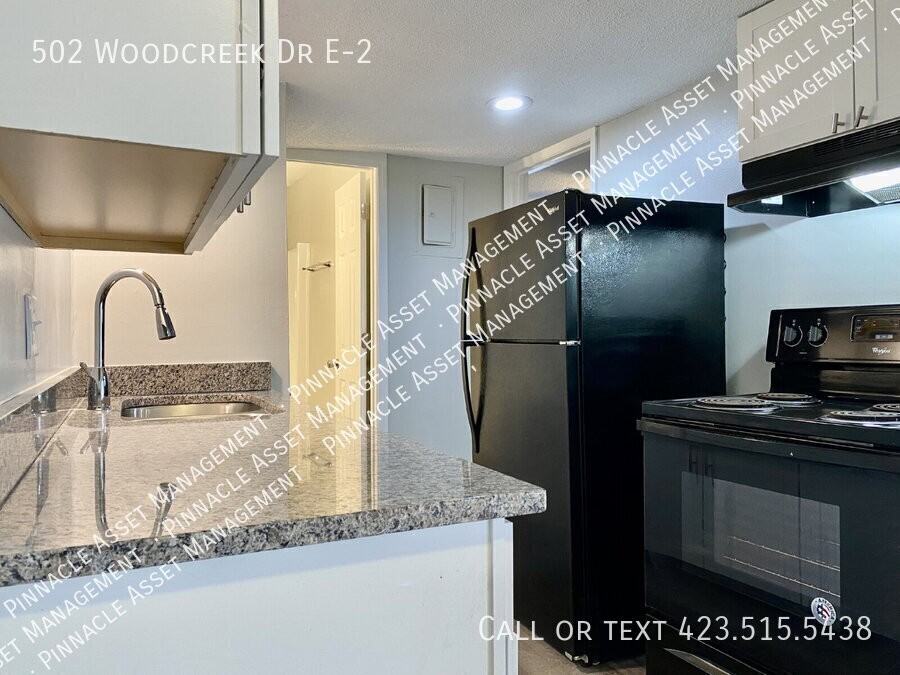 502 Woodcreek Dr - Photo 4 of 8