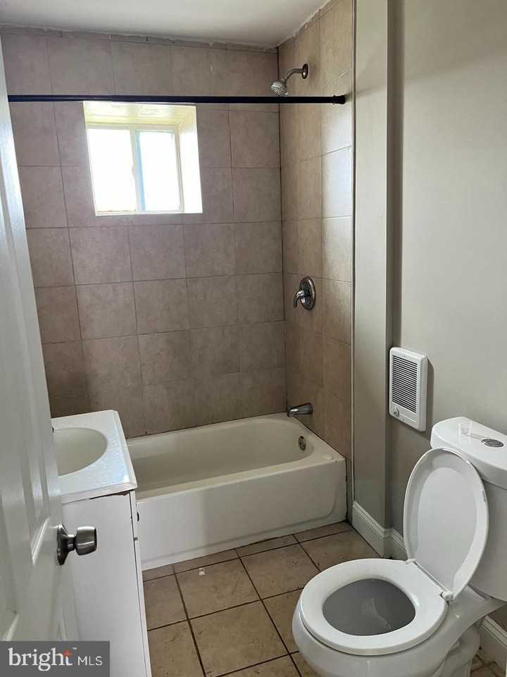 6171 Glenmore Ave - Photo 3 of 6