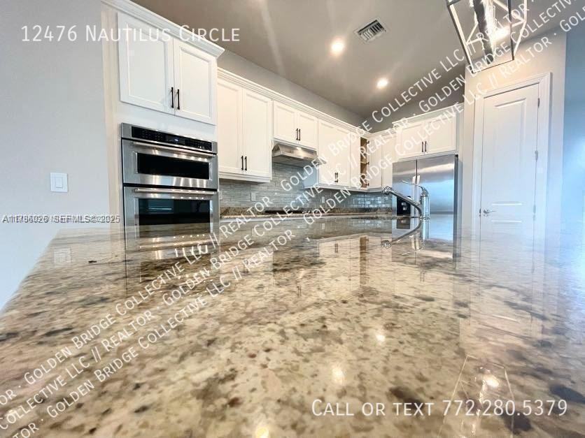 12476 Nautilus Cir - Photo 2 of 12