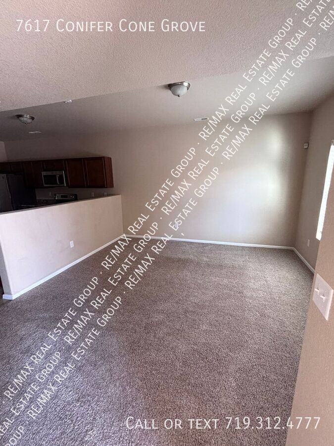 7617 Conifer Cone Grv - Photo 2 of 9