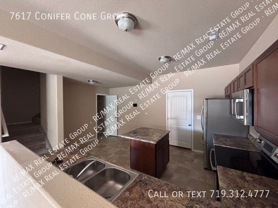 7617 Conifer Cone Grv - Photo 4 of 9