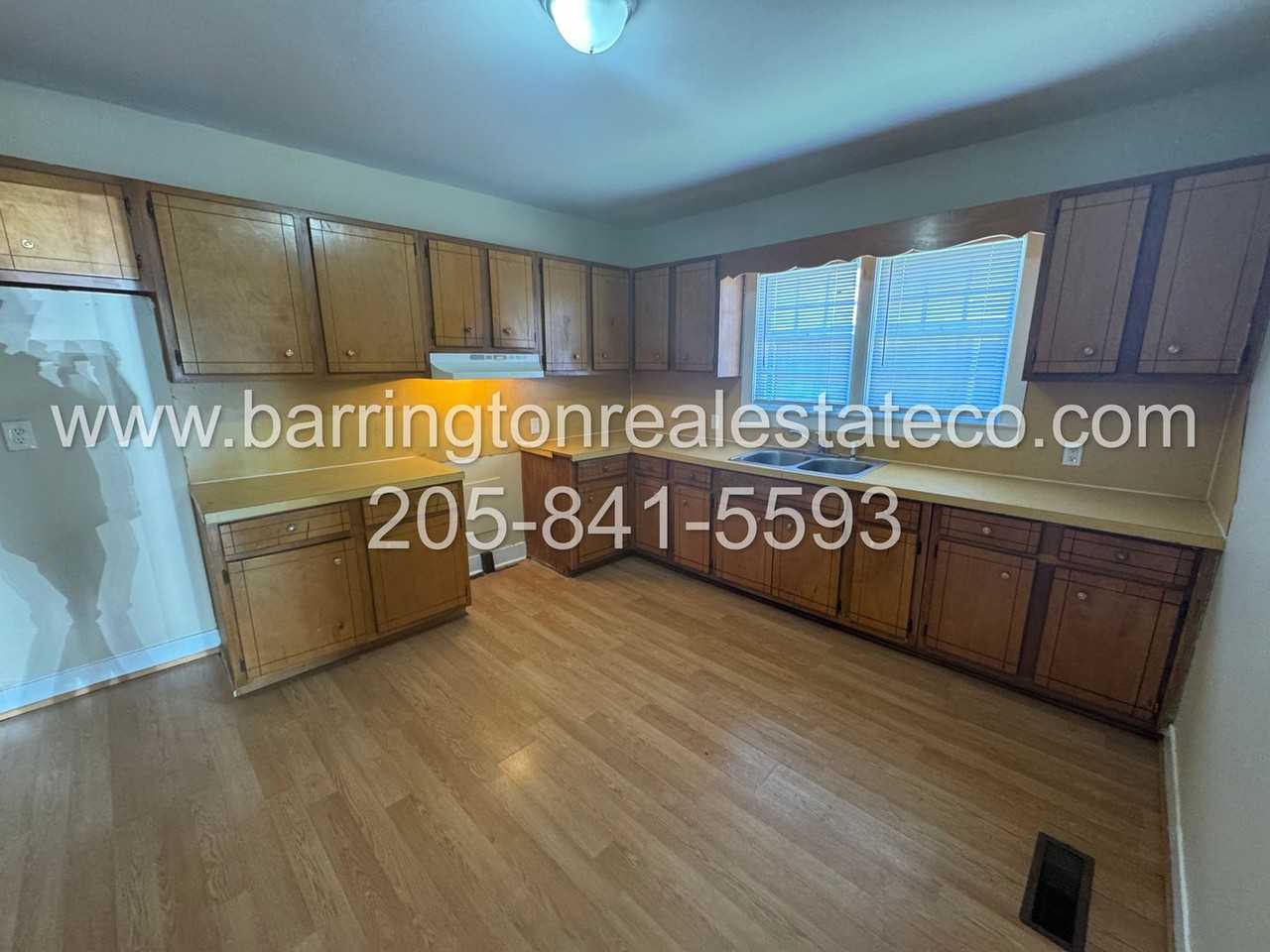 705 60th St - Photo 3 of 4