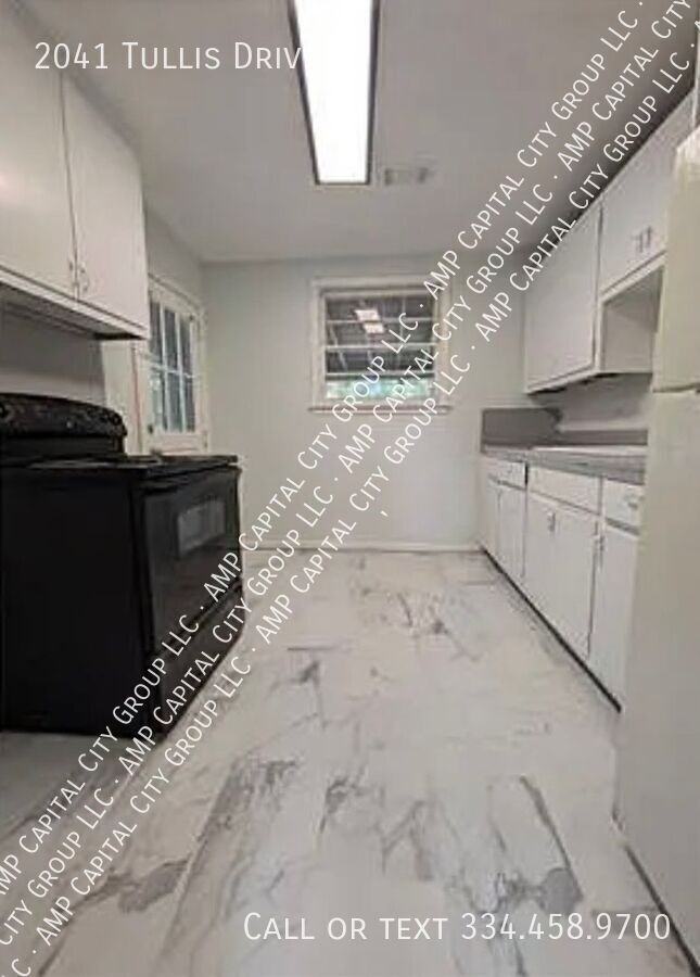 2041 Tullis Dr - Photo 3 of 7