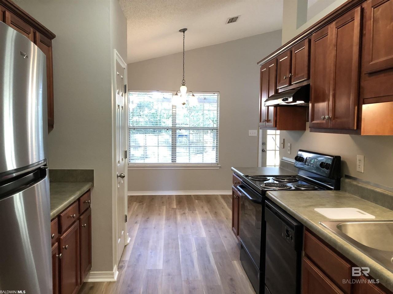 9839 Hollowbrook Ave - Photo 4 of 29