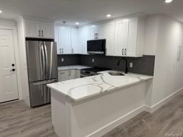 featured image of 19 Bellport Ln Unit 1 #1