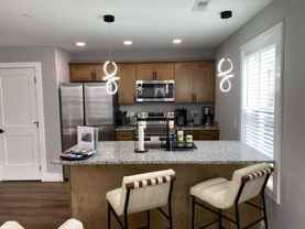 Modern Townhomes Near UTK | 2–6 Bedroom Floor Plans + Rooftop Patios - Photo 1 of 1