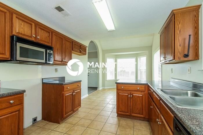 7299 Pinnacle Oaks Dr - Photo 5 of 16