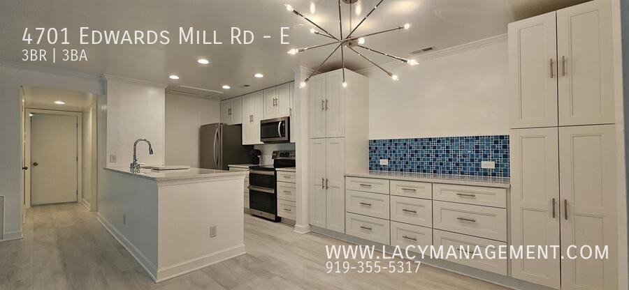 4701 Edwards Mill Rd #E - Photo 5 of 29