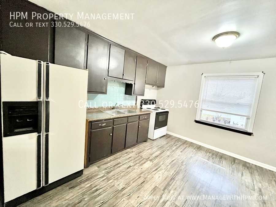 13705 Lakewood Heights Blvd #6 - Photo 5 of 7