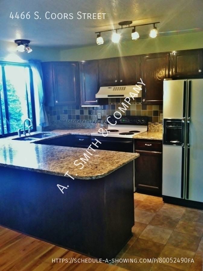 4466 S Coors St - Photo 2 of 7