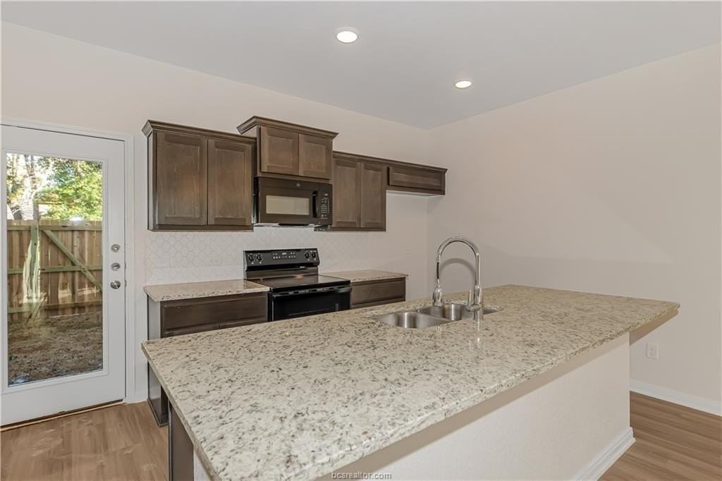 601 W 24th St Apt 112 #112 - Photo 5 of 17