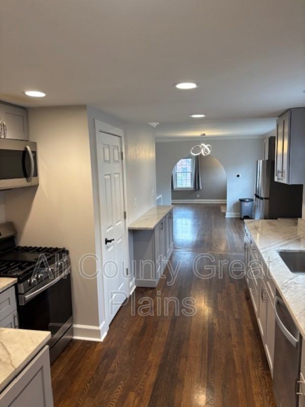 310 E 70th Ter - Photo 6 of 13