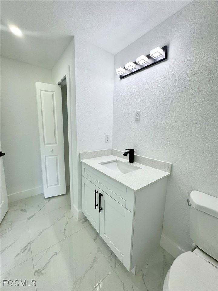 668 Chemstrand St E - Photo 4 of 36