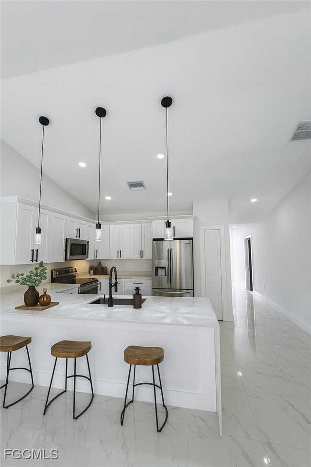 668 Chemstrand St E - Photo 6 of 36